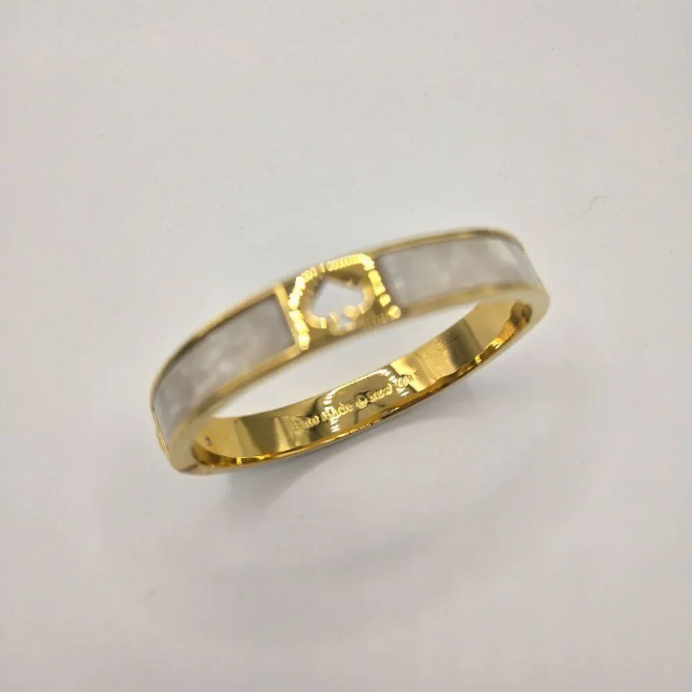 Kate Spade Gold-Tone Bangle Bracelet Mother Of Pearl Inlay Punch Spade